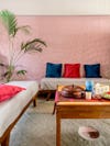 living room with pink wall