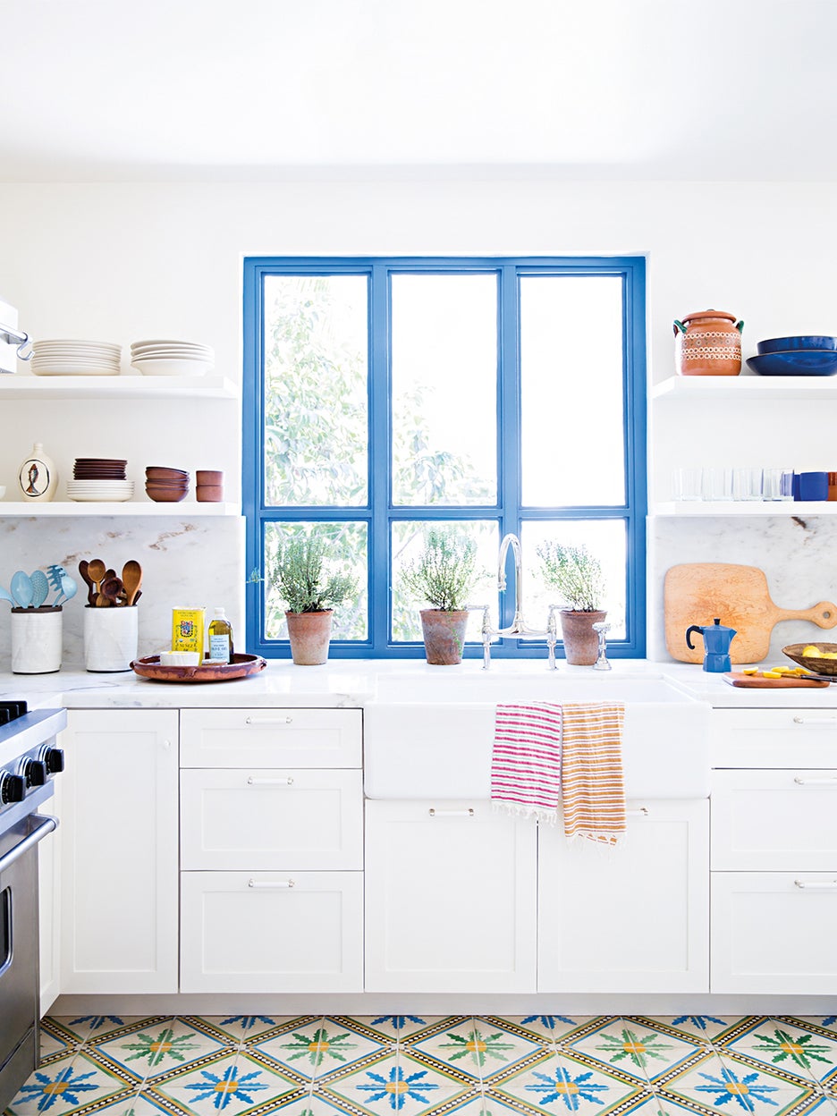 white kitchen wiht blue window trim