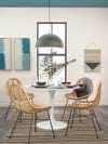 dining nook with wicker chairs and blue paint