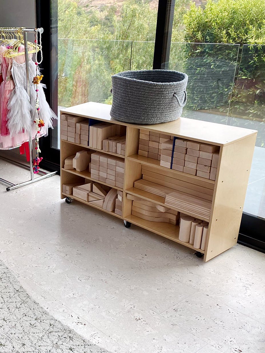 wooden shelf with building blocks