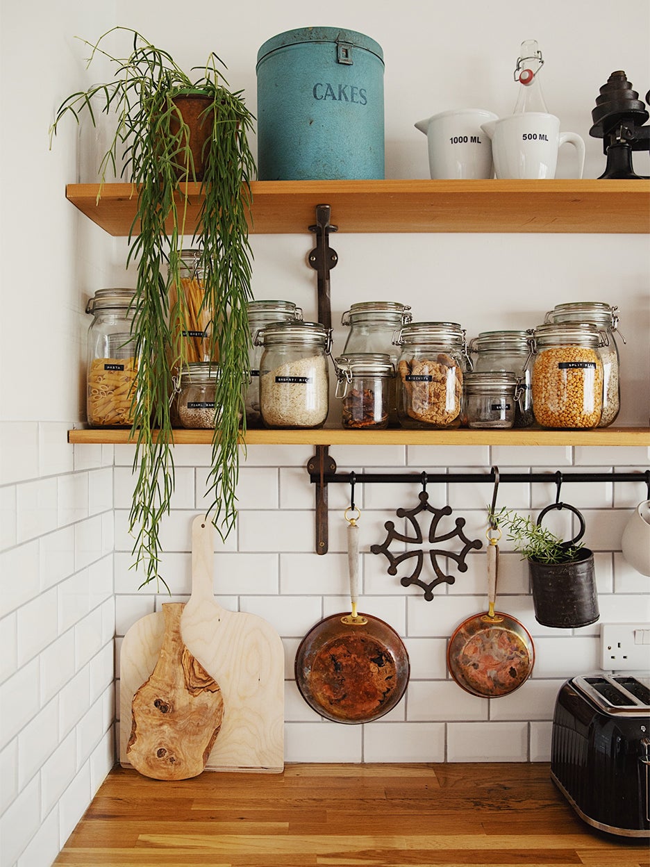 antique kitchen open shelving with clear canisters