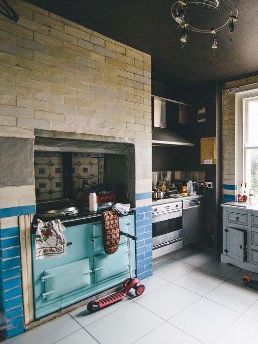 blue and white kitchen with turquoise Aga stove