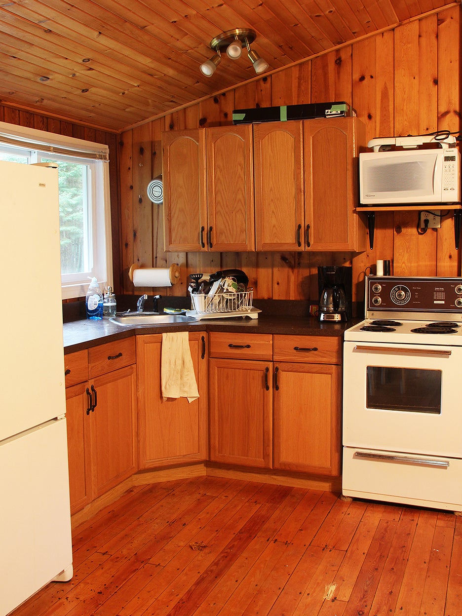 Wood-paneled kitchen