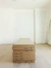 IKEA boxes in empty room