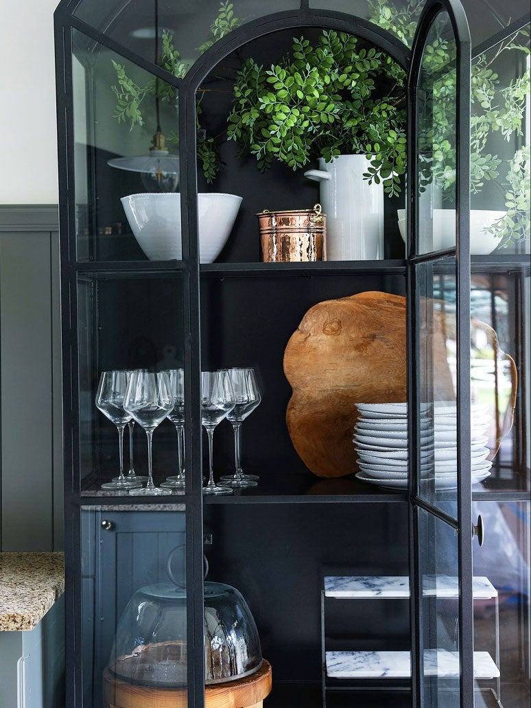black cabinet with glass doors