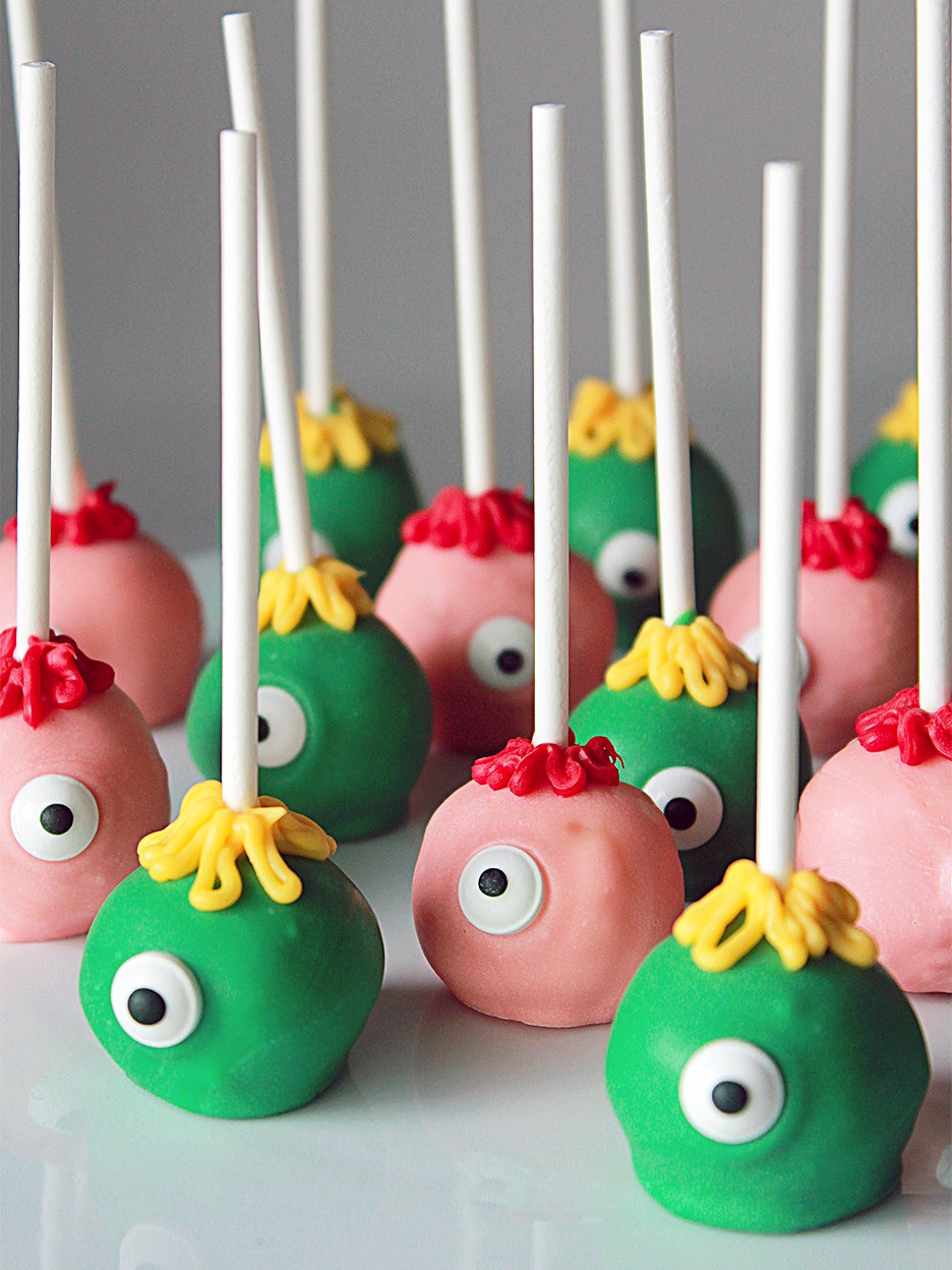 colorful cake pops shaped like monsters
