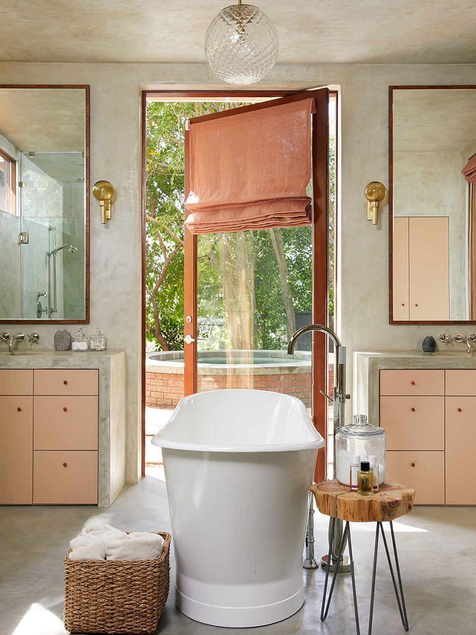 Concrete bathroom with blush curtains