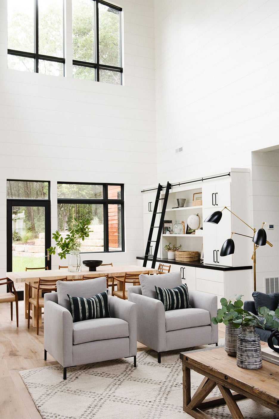 living room with black ladder