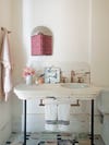 Art Deco vanity in blush bathroom