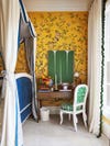 Yellow chinoiserie wallpaper in bedroom