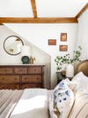 bedroom with wood beams