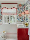 Kids bathroom with red striped window shade