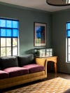 Blue window shade in lounge room