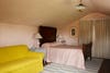 Pink lime washed walls in bedroom