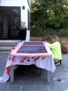 person painting door on table