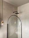 shower with gray walls