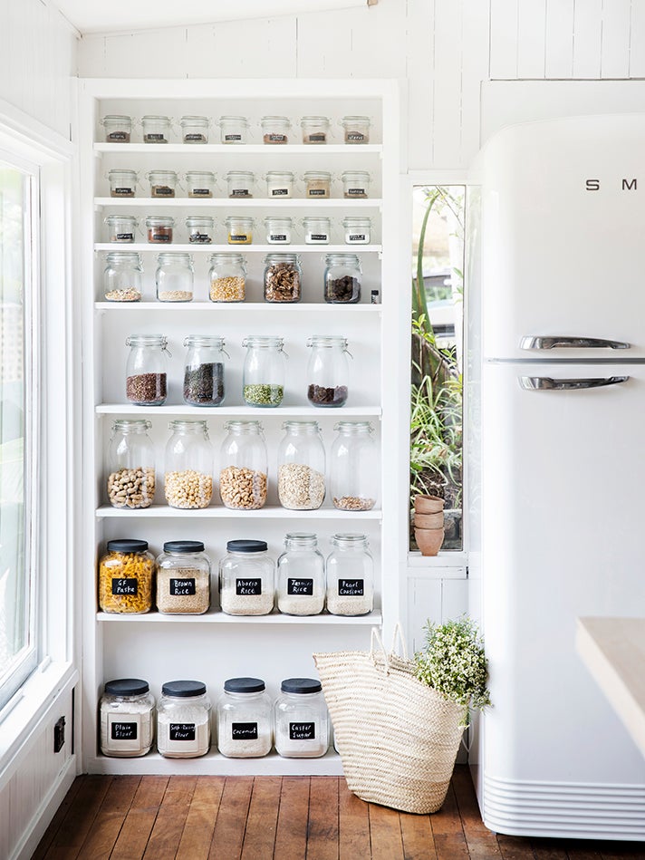 glass jars on open shelves