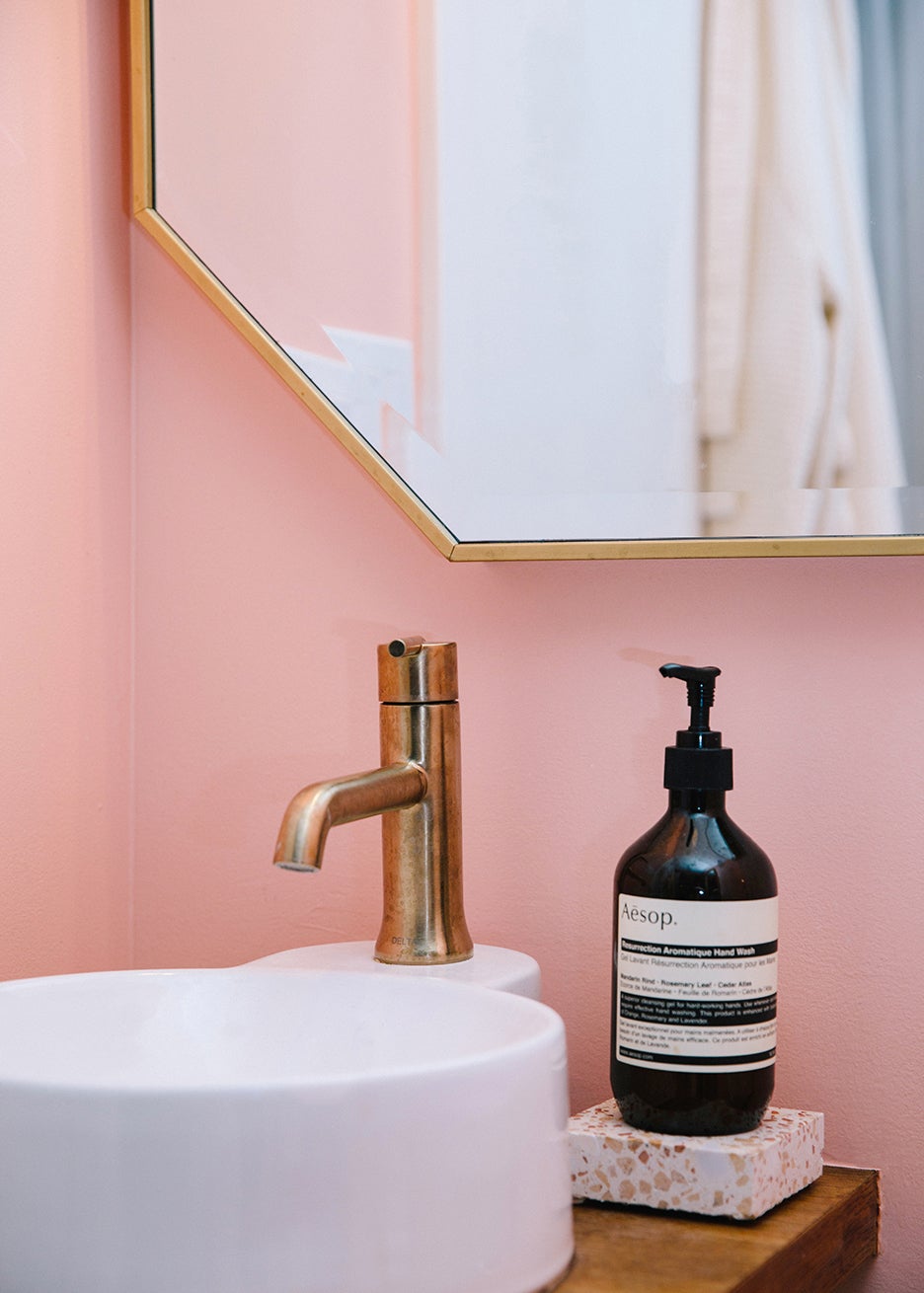 pink walls with vanity sink