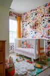 nursery with multicolor paint stroke wallpaper 