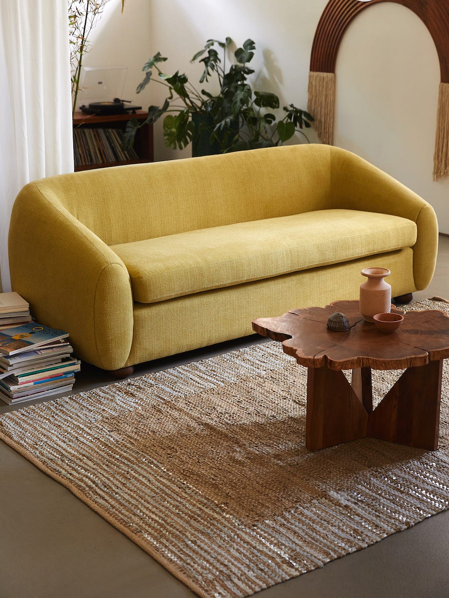 living room wiht yellow sofa