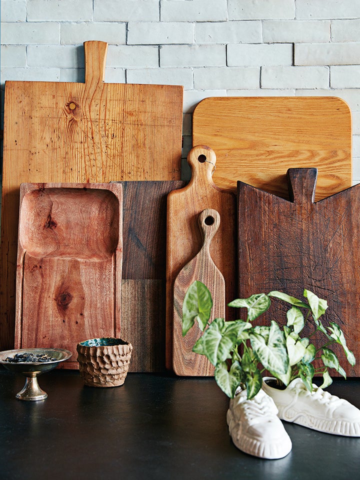 cutting boards up against a wall