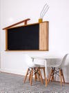 chalkboard with small table
