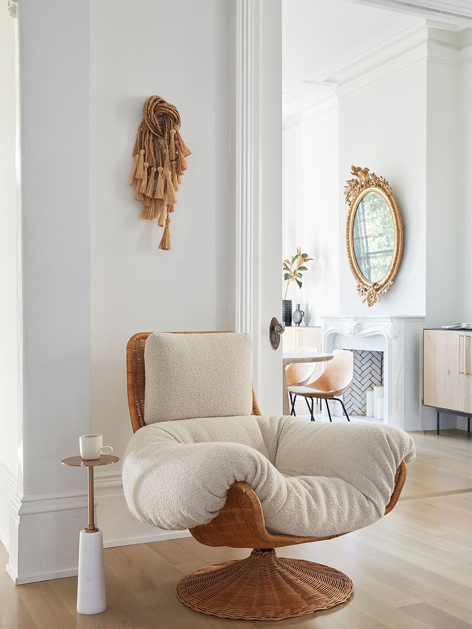 Cozy soft chair in a white living room