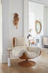 Cozy soft chair in a white living room
