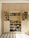 beige pantry with doors open
