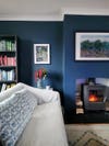 Navy living room with white sofa