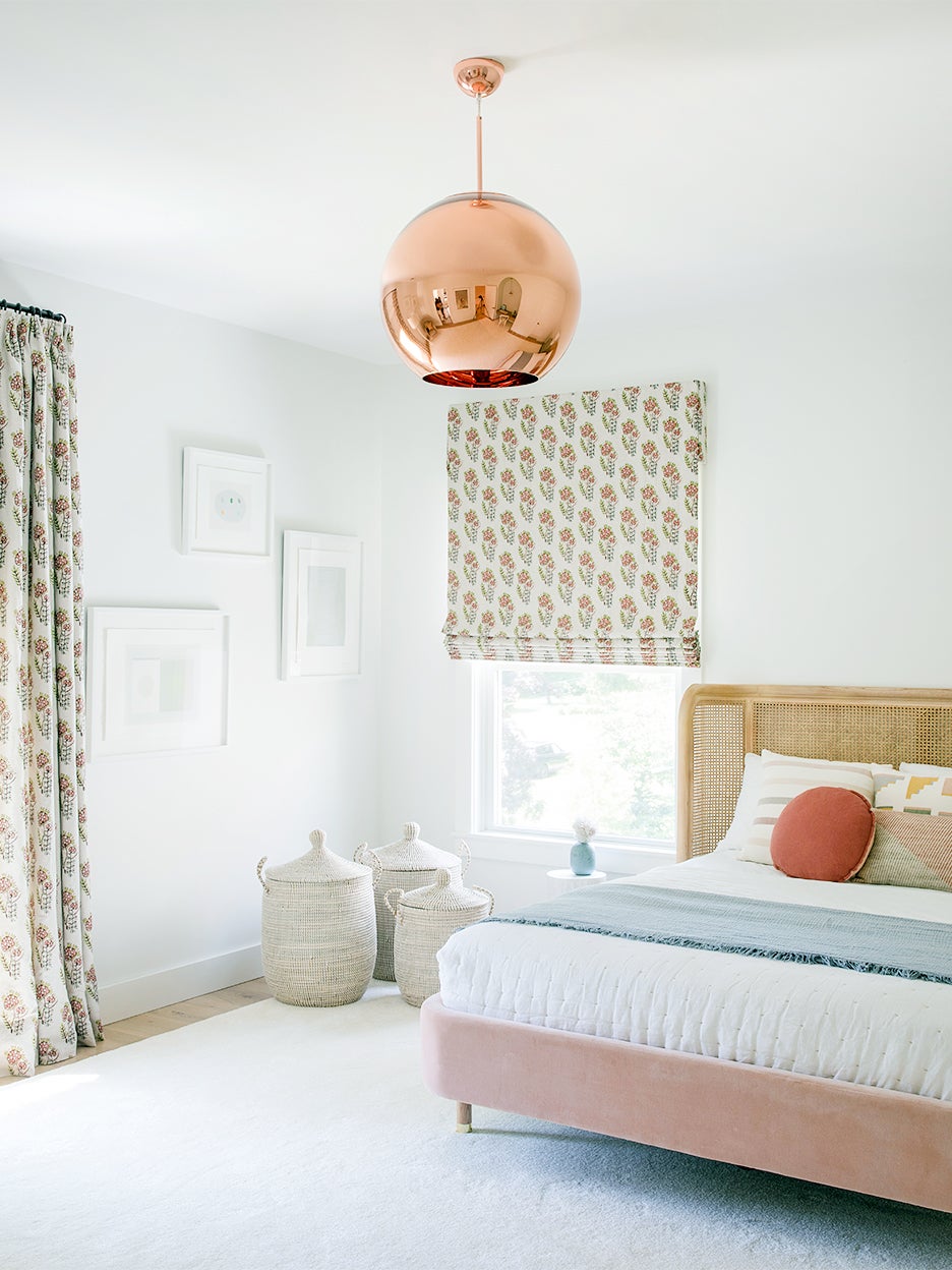 Girls bedroom with brass pendant lamp