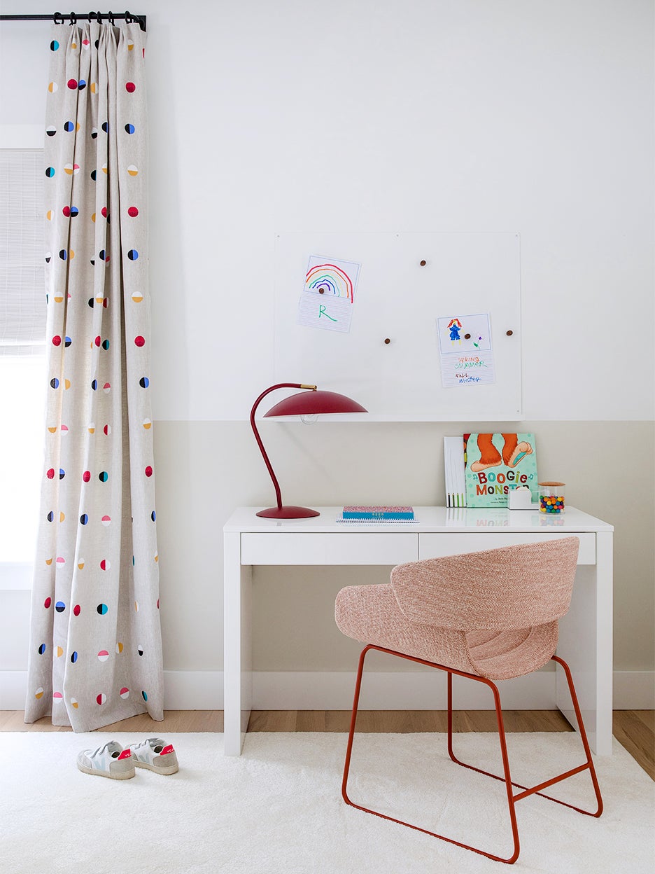 girls desk with chair and colorful curtains