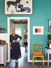 Designer Sheila Bridges stands in the doorway of her Hudson Valley home