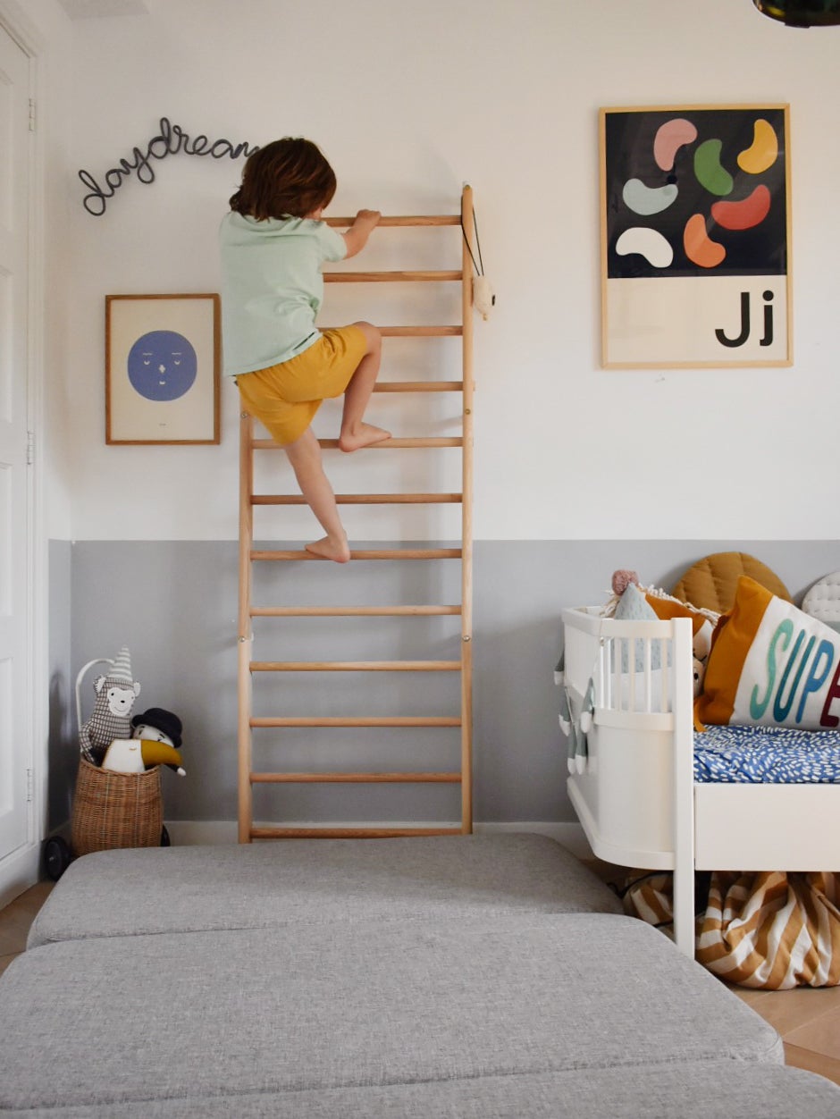 child climbing ladder