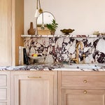 Purple marble backsplash in kitchen