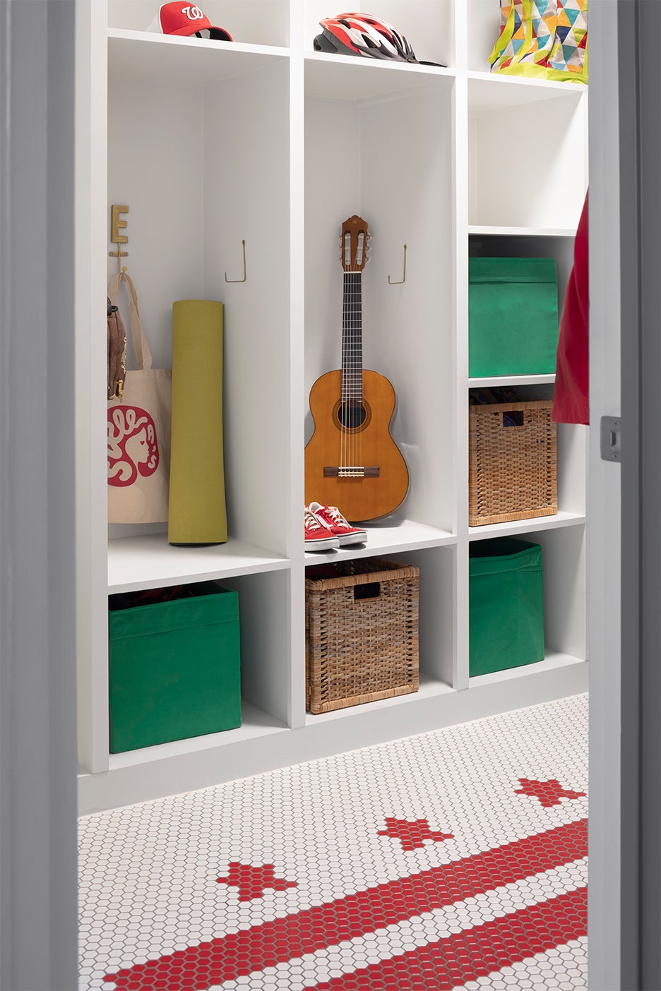 Mudroom with American flag penny tile design