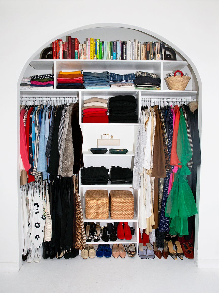 open closet with arched opening
