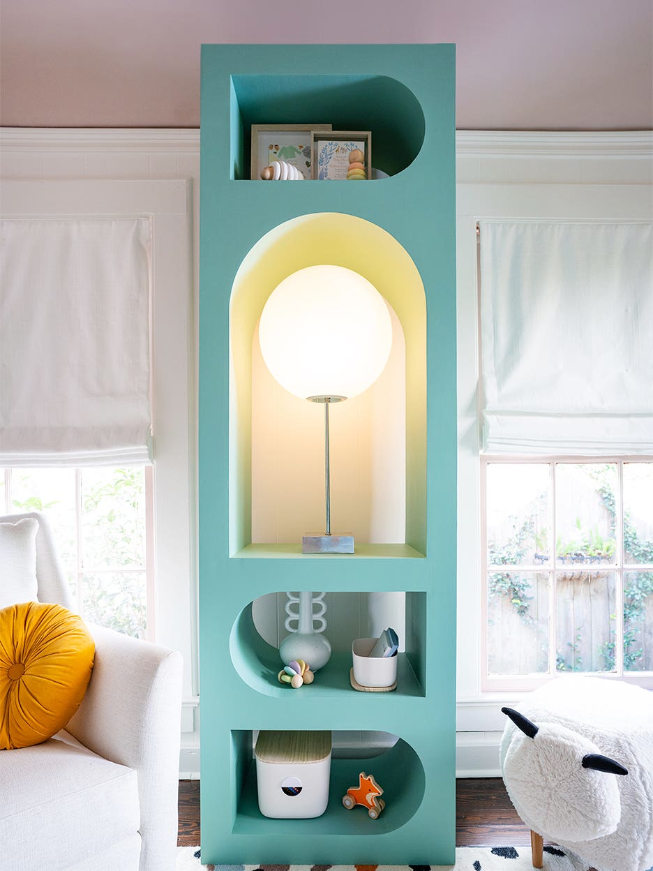 blue bookcase with bright lamp