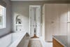 marble tub with plastered wall niche