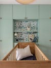 Sage green kids bedrooms - nursery with green custom closet