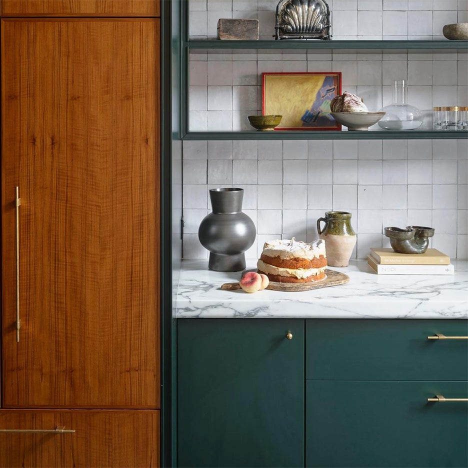 wood fridge cabinet next to green lowers