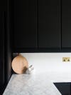 black cabinets with white counter