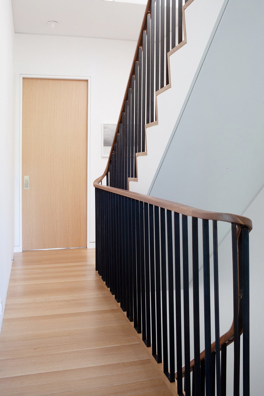 curved steel and wood staircase
