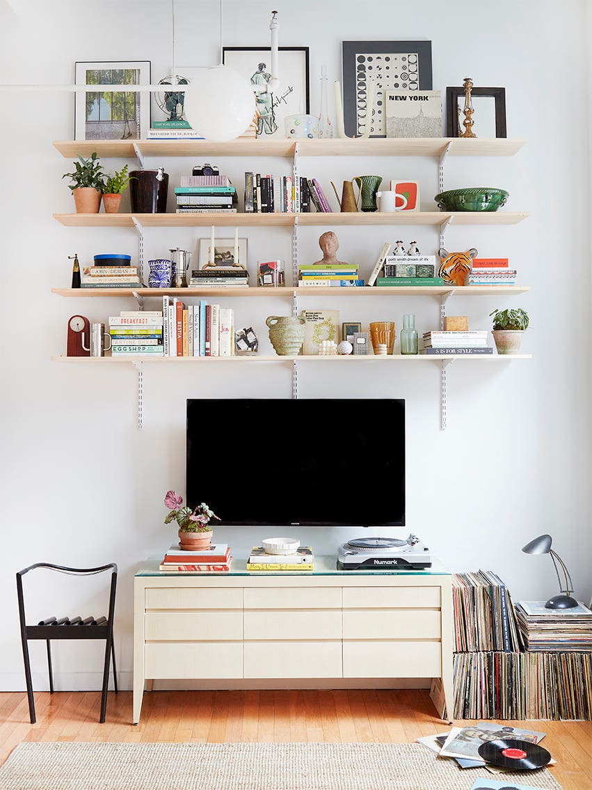 This $130 Shelving System Is the Focal Point of Our Style Editor's Living Room