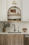 arched shelf over sink