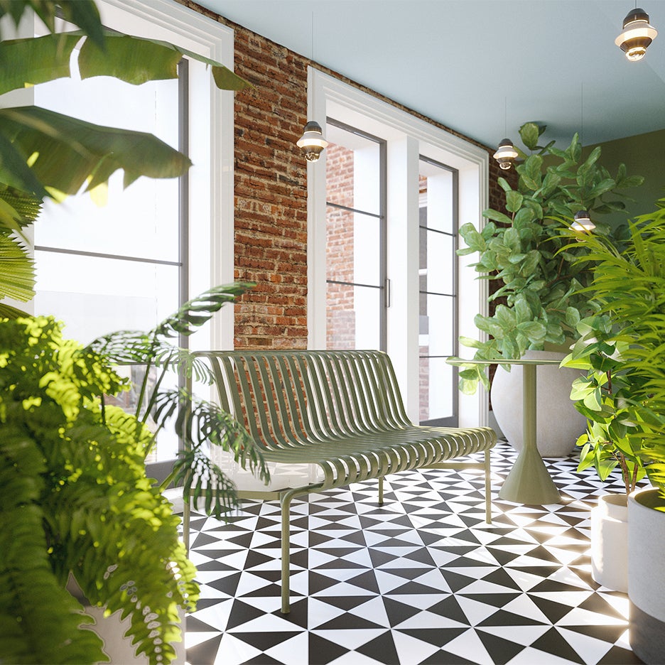 graphic floor tiles in a room filled with plants