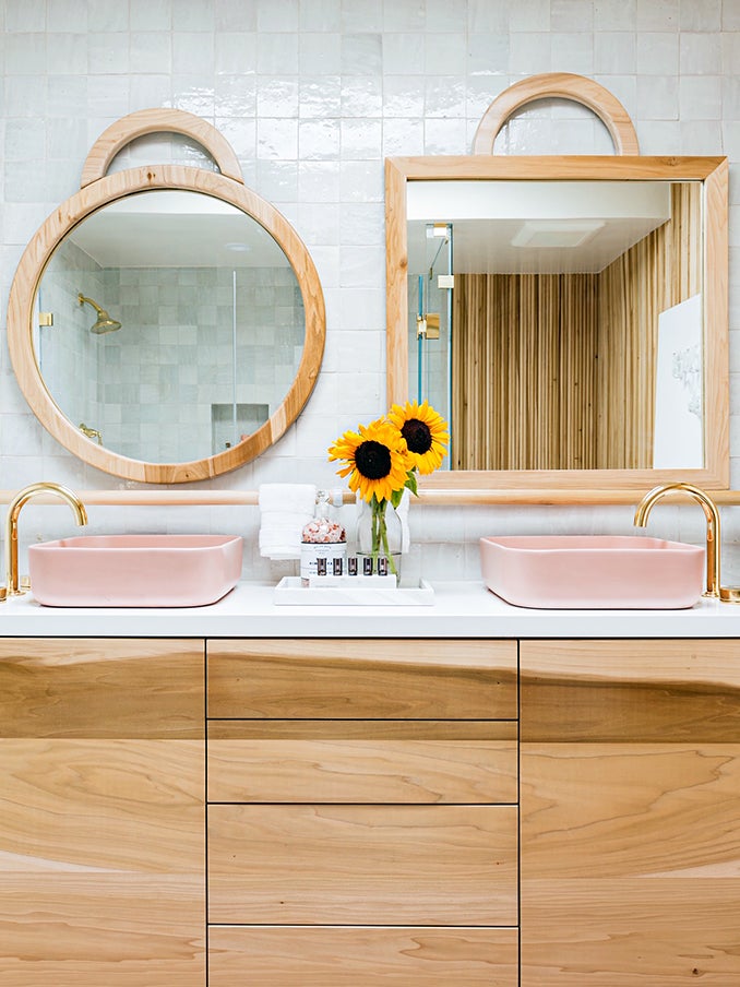 organicw wood vanity wiht pink sinks