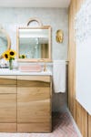organicw wood vanity wiht pink sinks