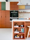 wood cabinets with green and yellow mixed in