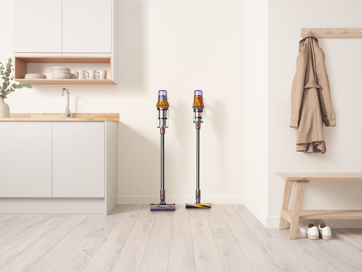 two Dyson vacuums
